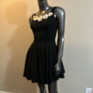 Chic Black Dress with Embellished Neckline
